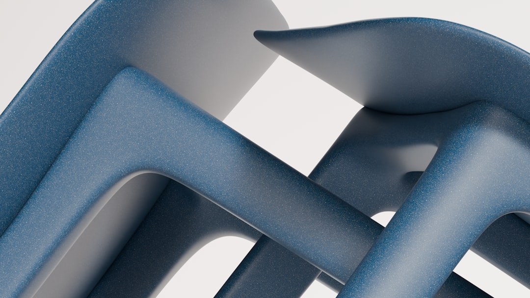 Stacked blue aluminum chairs ready for transport and storage