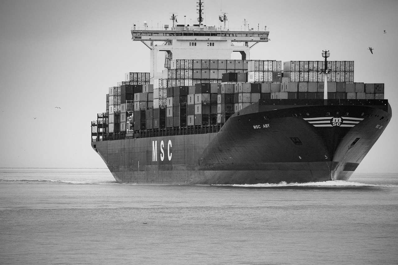 Container ship loaded with shipping containers at port