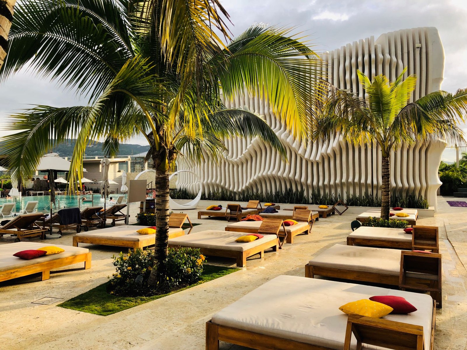 Poolside resort terrace in Australia furnished with commercial aluminium outdoor furniture imported from a China factory
