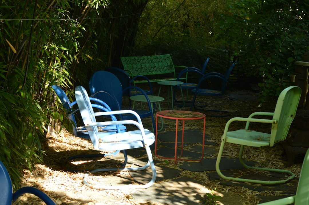 Powder-coated aluminium chairs in colour options for an Australian commercial outdoor furniture order