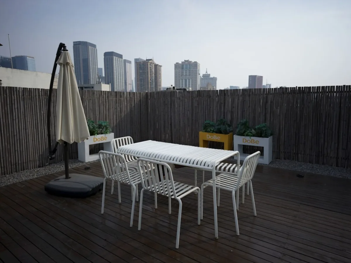 Rooftop patio dining furniture layout for a commercial project