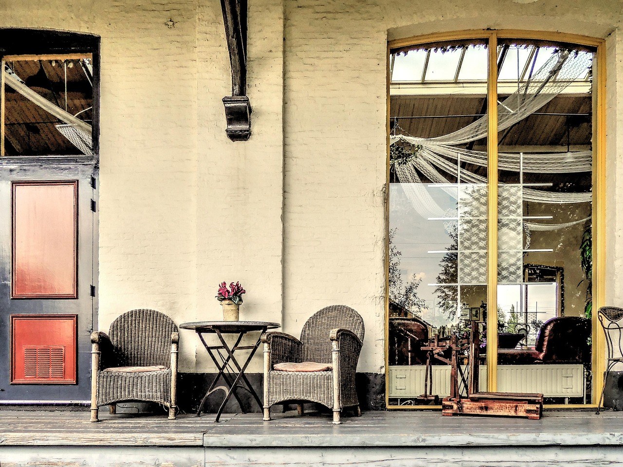 Rattan terrace seating on a paved outdoor area